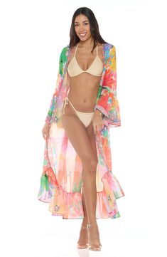 A vibrant tropical-inspired pattern enlivens this vacation-ready duster framed with three-quarter ruffle sleeves. 52" length (size One Size) Open front Three-quarter sleeves 100% polyester Hand wash, dry flat Imported Spring Tropical Print Cover-up For Poolside, Spring Long Sleeve Pool Cover-up, Spring Tropical Print Cover-up, Tropical Style Swimwear For Spring Brunch, Tropical Swimwear For Spring Brunch, Spring Tropical Print Beachwear Cover-up, Spring Beachwear Cover-up With Tropical Print, Spring Tropical Print Cover-up For Beach Party, Multicolor Tropical Print Cover-up For Spring