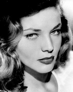 black and white photograph of a woman with long hair