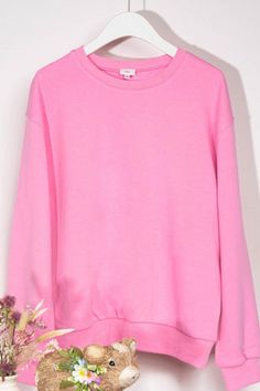 Spring Sweatshirt With Soft Texture, Solid Color Soft Texture Sweatshirt For Spring, Soft Texture Sweatshirt For Spring, Soft Texture Solid Color Sweatshirt For Spring, Pink Soft Crew Neck Top, Pink Soft Texture Crew Neck Top, Cozy Fit Long Sleeve Sweatshirt With Soft Texture, Plain Relaxed Fit Sweater For Spring, Cozy Fit Long Sleeve Soft Texture Sweatshirt