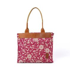 "MARSALA KALAMKARI LARGE TOTE BAG Fabric & leather tote bag: The chic maroon/marsala colour kalamkari print tote bag combined with real tan leather The bag has a zipped pocket, a mobile phone pocket and a small accessories pocket in the inside. Also has a buttoned pocket on the outside The bag has metallic zip closure and cotton canvas handle. Easy to carry and manage. Material : cotton printed lining inside. Size: Height 12\"; width 14\", gusset 4\", handle height 13\" * In stock, ready to ship Pink Canvas Bag With Leather Handles, Pink Canvas Tote Bag With Leather Handles, Pink Coated Canvas Shoulder Bag For Everyday, Daily Use Coated Canvas Tote Bag, Coated Canvas Tote Shoulder Bag For Daily Use, Tan Canvas Bags With Adjustable Strap, Rectangular Tan Canvas Shoulder Bag, Red Canvas Bags For Errands, Red Canvas Bag For Errands