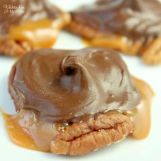 chocolate covered doughnuts with peanut butter on top