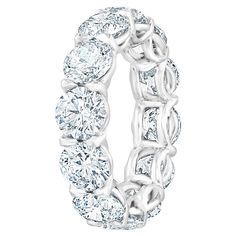 This beautiful Eternity Ring is set with 12 perfectly matched Round Brilliant Cut Diamonds, each weighing between 0.7ct to 0.72ct totaling 8.60 Carats. Made in New York City using Platinum 950. Fits US Size 6.25 Diamonds are of I-J color and SI clarity. Ring can be sized slightly or a new setting can be made to accommodate any finger size. Also available and/or can be made to order in different diamond sizes and qualities as the wearer is trying to achieve. Contact us with any questions or quote Expensive Jewelry Luxury, Diamond Eternity Ring, Diamond Jewelry Designs, Eternity Band Ring, Expensive Jewelry, Eternity Ring Diamond, Diamond Eternity, Ring Band, Brilliant Diamond