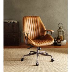 an office chair sitting on top of a rug