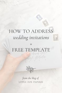 a person holding some envelopes with the words how to address wedding invitations and free template from the blog of little fox paper