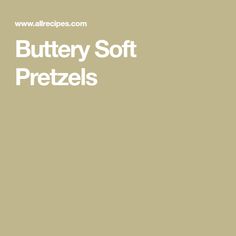 the words buttery soft pretzels are written in white on a beige background