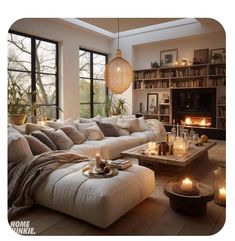 a living room filled with furniture and candles