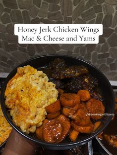 a bowl filled with lots of different types of food next to a sign that says honey jelk chicken wings mac and cheese and yams