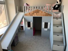 a child's bedroom with bunk beds and stairs