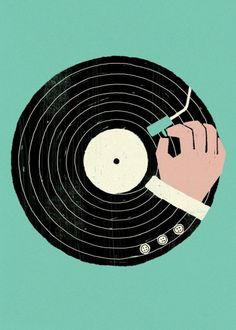 a person holding a record in their hand and pressing the disc on it with a needle