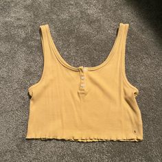 New With Tags *Mustard Yellow Coloring *Cropped Ribbed Tank *3 Buttons All Intact Casual Cropped Yellow Tank Top, Casual Yellow Cropped Tops, Casual Yellow Ribbed Top, Casual Yellow Cropped Crop Top, American Eagle Shirt, Eagle Tee, Green Flannel, Strapless Crop Top, Eagle Shirts