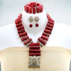 Elevate your bridal look with this stunning wedding necklace African Wedding Jewelry, Coral Jewelry Set, Water Soluble Fabric, Crystal Clutch, Bridal Accessories Jewelry, Cubic Zirconia Jewelry, Natural Coral, African Lace, Jewelry Tags