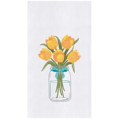 yellow flowers are in a mason jar on a white tablecloth with a blue ribbon