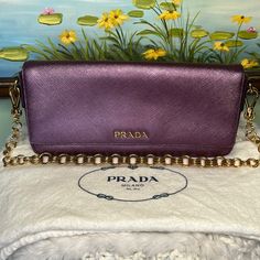 Beautiful Purple Prada Clutch With Gold Removable Chain. Comes With Dust Bag. Measurements Upon Request :) Luxury Purple Rectangular Evening Bag, Purple Prada Handbags, Purple Prada Handbag, Luxury Purple Rectangular Bag, Luxury Purple Clutch Shoulder Bag, Prada Clutch, Purple Rectangular Shoulder Bag With Gold-tone Hardware, Purple Clutch, Purple Shoulder Bag With Gold-tone Hardware And Double Handle