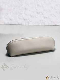 Bird in Bag - Solid Color PU Material Curved Zipper Pencil Case with Water Resistant and Multifunctional Design for Cosmetics and Business Use. White Pencil Case With Pen Slots For Everyday Use, White Pencil Case With Pen Slots, Everyday Portable Pencil Cosmetic Bag, Versatile Portable Pencil Case For School, White Rectangular Pencil Case For Everyday Use, Portable Rectangular Pencil Case For Daily Use, Portable Everyday Rectangular Pencil Case, Everyday Portable Rectangular Pencil Case, Modern Rectangular Pencil Case For Personal Use