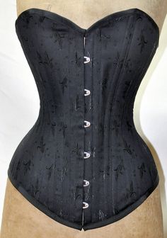 Black Corset Dress With Boning, Black Corset Dress With Boning And Fitted Bodice, Strapless Fitted Corset Dress For Costumes, Gothic Strapless Costume Corset, Black Fitted Gothic Corset Dress, Black Fitted Corset For Costumes, Elegant Black Underbust Corset Dress, Black Lace Bodice With Boned Detail, Gothic Underbust Fitted Corset Dress