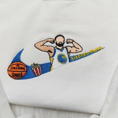 a white shirt with an image of a basketball player on it