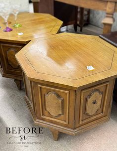 two wooden tables sitting next to each other on top of a carpeted floor in front of a table with chairs