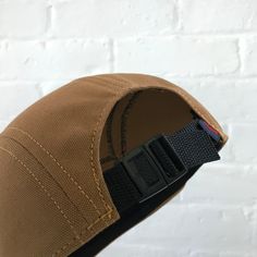 "Handmade cap with pencil holder✏️ ✎DETAILS: 5 panel cap is handmade from 12oz heavy duty caramel duck canvas ( made in USA). Sewn with golden heavy duty top stitch thread. Patch, brim and hardware made in the USA. The brim is not a bought plastic insert. Brims are handmade here in house, they are shorter and softer than typical hats. They are super comfortable yet still completely hand washable and incredible durable. Hand built by two human makers ( apes/April & bird/Rich) with love, care Adjustable Canvas Snapback Hat With Flat Bill, Adjustable Canvas Snapback Trucker Hat, Brown Baseball Cap For Everyday, Casual Canvas 5-panel Baseball Cap, Adjustable 5-panel Dad Hat For Everyday, Adjustable Canvas Dad Hat For Everyday, Adjustable Brown Hat For Everyday Use, Brown Canvas Baseball Cap, Everyday Six-panel Canvas Baseball Cap