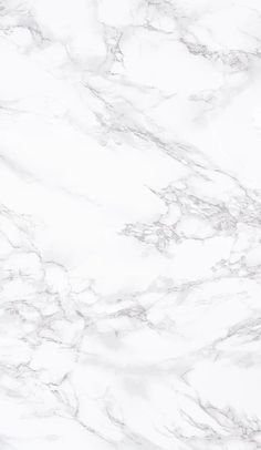 a white marble textured background that looks like it could be used as a wallpaper