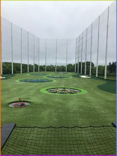 a golf course with several holes in the grass