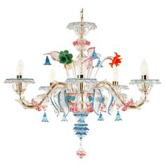 a glass chandelier with five lights and flowers on the bottom one light is gold