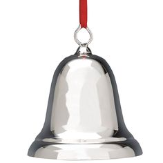 a silver bell with a red cord hanging from it's side on a white background