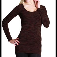 One Of Our Personal Favorites, This Long Ssleeve Zebra Print Top Comes In A Very Stretchy Fabric That Can Stretch To Any Size. The Boatneck Neckline Shows Off Your Shoulders And Elongates Your Neck Making You Appear Slimmer And Taller. Perfect Layering Piece For All Seasons. Can Be Worn Off The Shoulder Or As A Boatneck Top. 92% Nylon 8% Spandex Fitted Black Tiger Print Top, Fitted Black Top With Tiger Print, Fitted Tiger Print Top For Fall, Black Tiger Print Long Sleeve Tops, Black Long Sleeve Tiger Print Tops, Black Long Sleeve Top With Tiger Print, Casual Fitted Top With Tiger Print, Casual Stretch Tiger Print Tops, Trendy Long Sleeve Tiger Print Tops