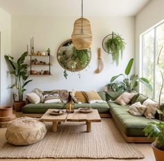 a living room filled with lots of green furniture and potted plants on the wall