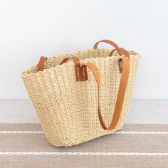 IN STOCK. FAST SHIPPING FROM LOS ANGELES. 3-5 DAYS Chic simple straw woven tote bag perfect for all occasions.Size approximately 16 inches opening wide x9.5 inches tallShort handle 8.5 inches.Long handle 15 inches Designer Style ID: 8580 Brown Straw Bag With Rolled Handles, Brown Double Handle Straw Bag With Rolled Handles, Straw Satchel Bag With Rolled Handles For Shopping, Shopping Straw Satchel Bag With Rolled Handles, Travel Straw Satchel With Rolled Handles, Rectangular Straw Bag With Leather Handles For Shopping, Brown Straw Bags With Rolled Handles, Shopping Straw Bag With Rolled Handles, Palm Leaf Bucket Bag For Shopping