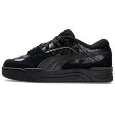 PUMA 180 Luxe Sport Low 'Black' 393218-01 Black Skate Shoes With Boost Midsole For Sports, Black Dynamic Skate Shoes For Streetwear, Dynamic Black Skate Shoes For Streetwear, Black Dynamic Skate Shoes With Rubber Sole, Classic Black Skate Shoes With Branded Insole, Black Leather Skate Shoes With Branded Insole, Urban Black Skate Shoes With Padded Tongue, Puma Black Sneakers, Black Sneakers