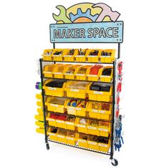 the maker space has many yellow bins on it