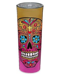 a colorful glass with a skull painted on it