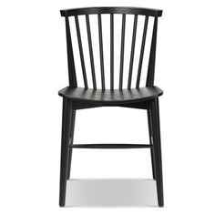 a black wooden chair against a white background with the seat upholstered to the side