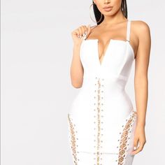 Hold It Together Bandage Dress -White Adjustable Straps Bandage Stretch Back Zip Metal Detail 35" Length 90% Polyester 10% Spandex White Stretch Bandage Bodycon Dress, White Bandage Bodycon Dress For Night Out, White Bandage Mini Dress For Club, Chic White Bandage Dress For Club, White Stretch Bandage Mini Dress, White Stretch Bandage Dress For Spring, White Bandage Bodycon Dress For Date Night, White Bandage Bodycon Dress For Spring, White Bandage Dress For Summer