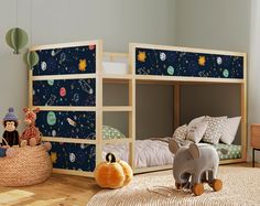 a child's bedroom with bunk beds and toys