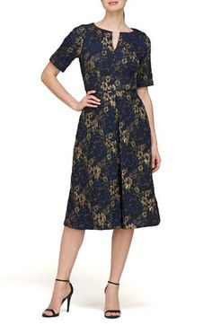 Enchant the crowd in this fit-and-flare cocktail dress cut from metallic jacquard with a graceful notched neck. 41" length Hidden back-zip closure V-neck Elbow-length sleeves Lined 100% polyester Dry clean Imported Gold Jacquard Party Dress, Gold Fitted Jacquard Dress, Fitted Gold Jacquard Dress, Formal Gold Jacquard Dress, Gold Fitted A-line Midi Dress, Evening A-line Brocade Dress, Elegant A-line Jacquard Midi Dress, Gold A-line Midi Dress For Evening, Jacquard Knee-length Midi Dress For Evening