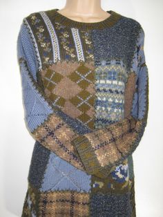 a mannequin wearing a multicolored sweater