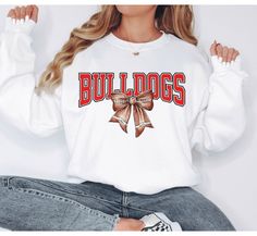 This custom football sweatshirt is a great gift for any football fan to show off their love for their favorite team by adding the name. ✨Shipping & Processing - Please allow 2-5 business days for your item to be processed and printed. Processing times may be longer during busy holiday periods. - Your order ships from the US. Allow 2-7 business days shipping. Unfortunately, I am unable to guarantee USPS shipping times. ✨Returns✨ If there is a defect with your order, please reach out to us within White Team Spirit Sweatshirt For Game Day, School Spirit Sweatshirt With Team Name For Fall, White Varsity Sweatshirt For School, Varsity White Sweatshirt For Football Season, White Sports Fan Sweatshirt For Fall, White Sweatshirt Fan Gear For Fall, White Fan Gear Sweatshirt For Fall, White Sweatshirt For Fall Fan Gear, Customizable Sports Fan Sweatshirt For Game Day