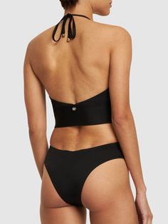 Back self-tie closure. Front and back cutouts. Front ring with metal logo detail. Model is wearing a size2 Elegant Cutout Backless Swimwear, Elegant Backless Cutout Swimwear, Elegant Halter Neck Swimwear With Cutout, Elegant Halter Neck Cutout Swimwear, Chic Evening Swimwear With Cutout, Chic Tie Back Halter Top For Swimming, Elegant Backless Halter Top For Swimming, Chic Low-back Swimwear For Party, Chic Low Back Swimwear For Party