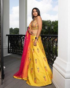 Make room for our one-of-a-kind vibrant lehenga that comes with everything a girl can imagine. Our perfectly sculpted bustier is matched effortlessly with the yellow skirt. The intricate, geometric embroidery and wonderful play of colors make this lehenga a great choice no matter what the occasion! DELIVERY TIMEPlease allow 4-6 months for your outfit to arrive. FABRIC DETAILSSilk. Professional cleaning only. Yellow Semi-stitched Art Silk Lehenga, Yellow And Purple Lehenga, Vibrant Lehenga, Yellow Brocade Lehenga, Lime Yellow Lehenga, Lehenga Yellow, Yellow Multicolor Lehenga, Bridal Bustier, Yellow Mirror