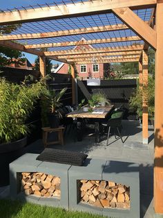 an instagram photo of a patio with firewood stacked on it