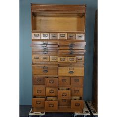 an old wooden dresser with many drawers