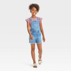 Update your casual outfits with these Cut-Off Jean Shortalls from Cat & Jack™. Made from stretchy denim fabric for flexible movement, the sleeveless shortalls feature a medium wash finish and a frayed hemline for a cool touch of laid-back style. The multiple utility pockets provide ample space to stash small items, while the adjustable shoulder straps with buckles offer a custom fit and the side snap buttons allow for easy on and off. They can match with their favorite tees for a quick and easy Simple Casual Outfits, Side Snap, Utility Pockets, Cut Off Jeans, Laid Back Style, Denim Fabric, Small Items, Kids Clothing, Girls Shopping