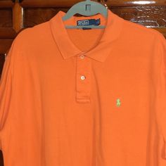 Authentic, custom fit, orange, Ralph Lauren, polo shirt. Size: men's large/ women's xl. Casual Orange Collared T-shirt, Orange Collared Cotton Polo Shirt, Classic Orange Collared Top, Orange Cotton Collared Polo Shirt, Orange Cotton Short Sleeve Polo Shirt, Reading Pa, Ralph Lauren Polo Shirt, May 21, Ralph Lauren Polo