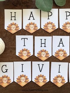 printable thanksgiving cards with the words happy thanksgiving written in front of them on a table