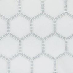 a white and grey hexagonal tile pattern