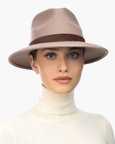 The versatile hand-blocked wool felt fedora banded with lamb leather is water-repellent. The Crown is fully lined. The elasticized inner band fits most. Packable. Made in the USA of imported materials. Sustainable wool is shorn and milled from multi-use sheep living on small farms under the most humane conditions. Designed and finished in USA Hand-blocked by skilled artisans Highest Quality Materials Sustainable wool Brim Span: 3"(7.6cm) Borsalino Hats, Small Leather Accessories, Small Farms, Band Fits, Wool Fedora, Felt Fedora, Women's Headwear, Navy Linen, Love Hat