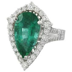 Stamped: 14K Total Ring Weight: 7 Grams Emerald Weight 5.10 Carat (15.90x8.80 Millimeters)Diamond Weight: 1.05 carat (F-G Color, VS2-SI1 Clarity )Face Measures: 23.95x16.40 Millimeter SKU: [600695] Fine Jewelry Pear-shaped Emerald Ring Vvs Clarity, Fine Jewelry Pear-shaped Emerald Ring With Vvs Clarity, Dazzling Pear-shaped Gia Certified Rings, Luxury Gia Certified Pear-shaped Rings, Luxury Pear-shaped Gia Certified Rings, Luxury Pear-shaped Emerald Ring For Formal Occasions, Exquisite Pear-shaped Gia Certified Rings, Formal Pear-shaped Emerald Ring In White Gold, Luxury Pear-shaped Brilliant Cut Emerald Ring