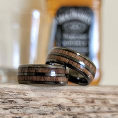 A truly unique whiskey barrel ring made of Jack Daniels aged oak barrels will make the perfect man wedding band or wooden ring gift for him. The 8mm wide tungsten base with wood inlay mimics the design of a classic whiskey barrel and is sure to grab attention. We are located in East Tennessee within driving distance of Jack Daniels Distillery and we invite you to shop all our hand made wood products including handmade ring boxes, fireplace mantels and our latest addition, handcrafted wood inlay Man Wedding Band, Inlay Rings, Whiskey Barrel Ring, Wooden Engagement Ring Boxes, Handmade Ring Box, Unique Ring Box, Barrel Wedding, Barrel Ring, Jack Daniels Distillery