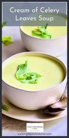 two white bowls filled with cream of celery leaves soup